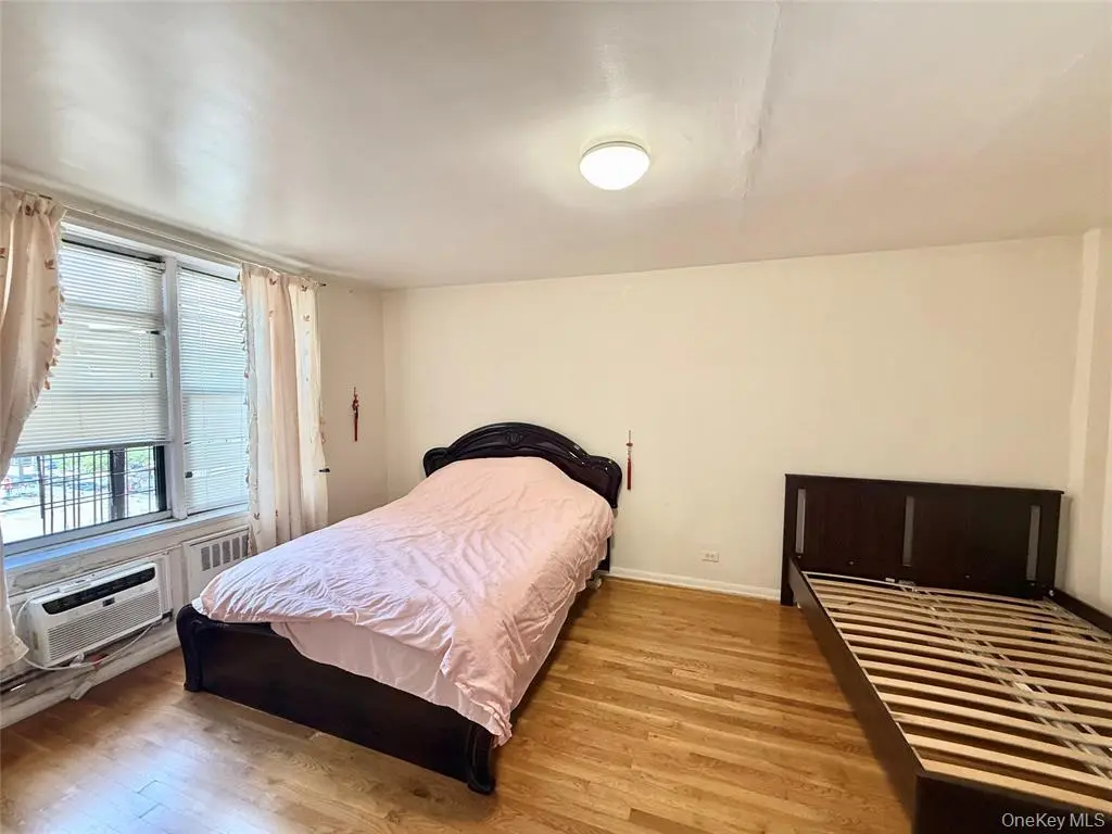 Spacious bedroom with two windows