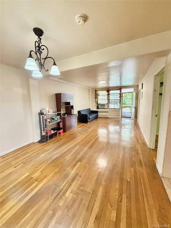 Long living and dining area with windows at both ends