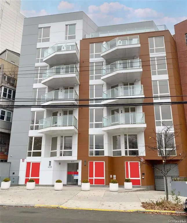 Modern condominium building exterior on Parsons Boulevard