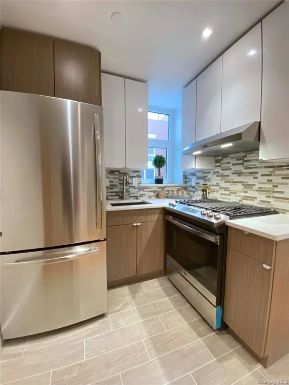 Modern kitchen with stainless steel appliances