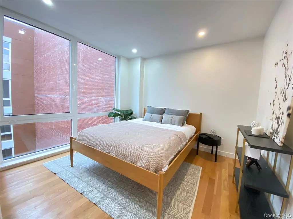 Bedroom with wall of windows