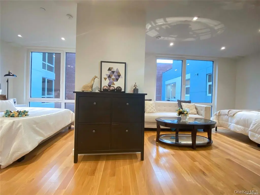 Large staged flexible room with multiple windows
