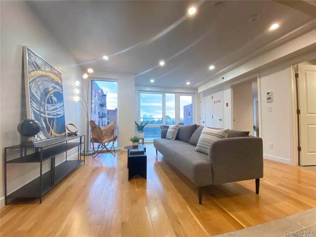 Living room with balcony beyond