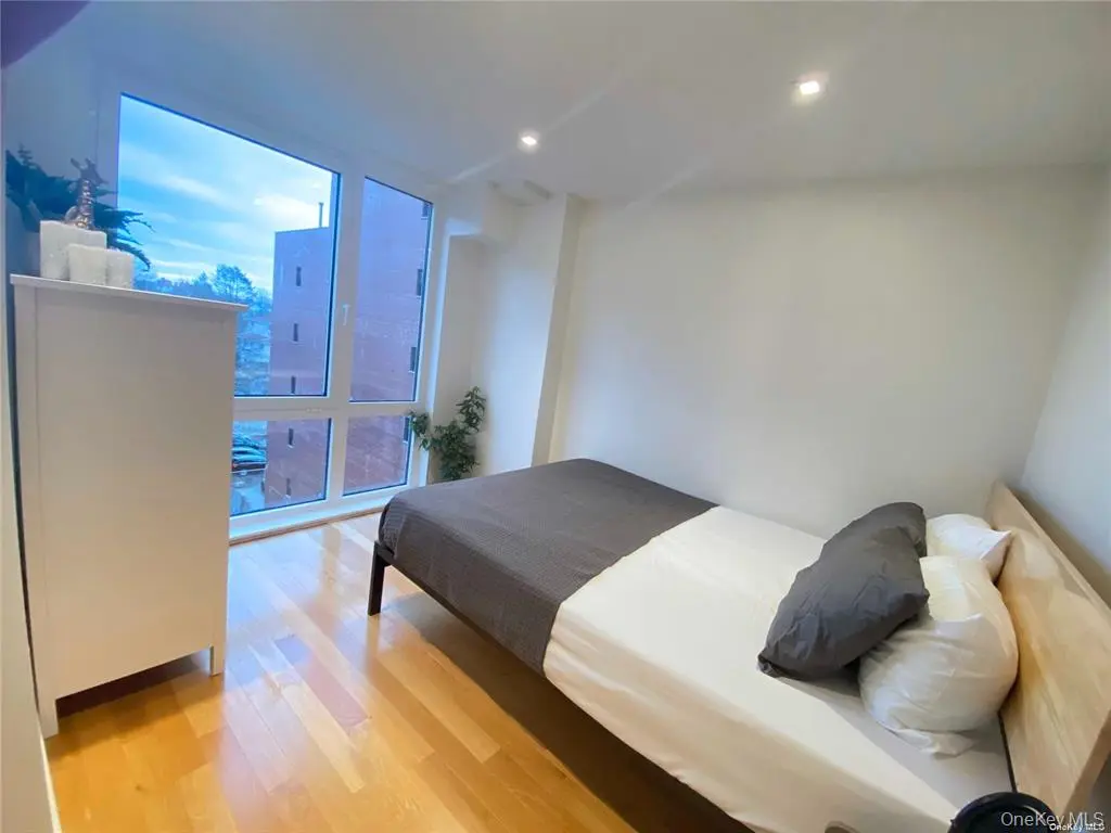 Bedroom with floor-to-ceiling windows