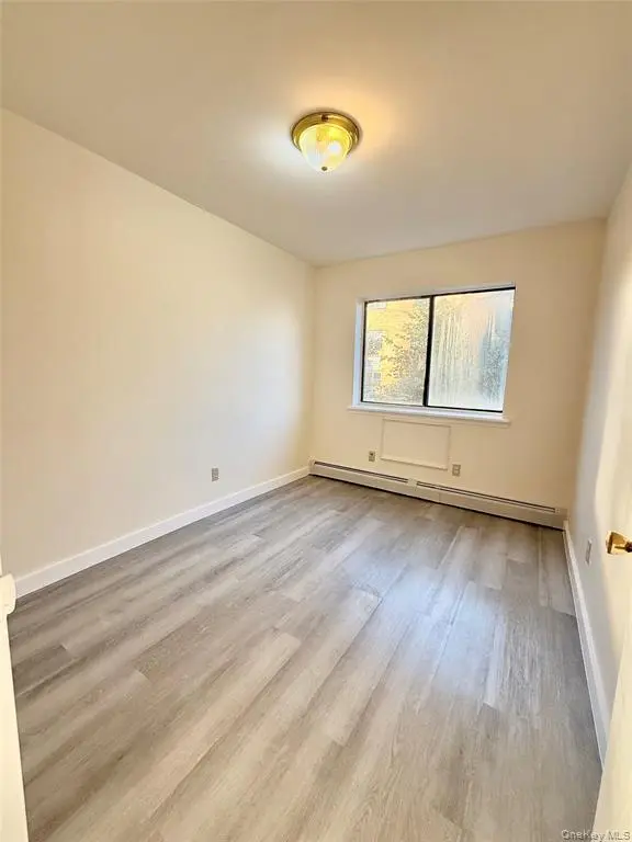 Bedroom with wood floor