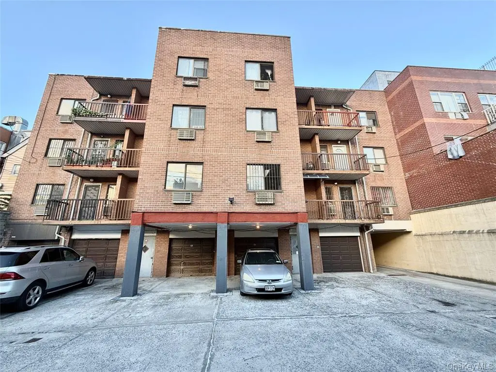 Rear building exterior and parking area