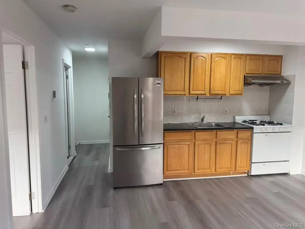 Open kitchen and refrigerator