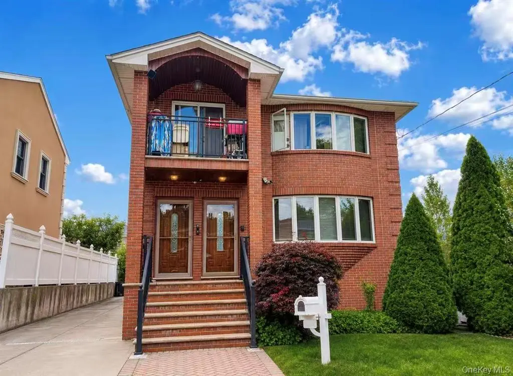 Brick home front exterior and driveway