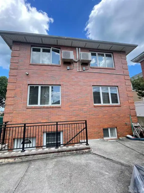 Rear exterior with basement access