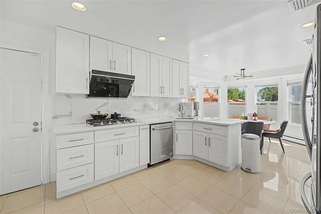 White kitchen with island