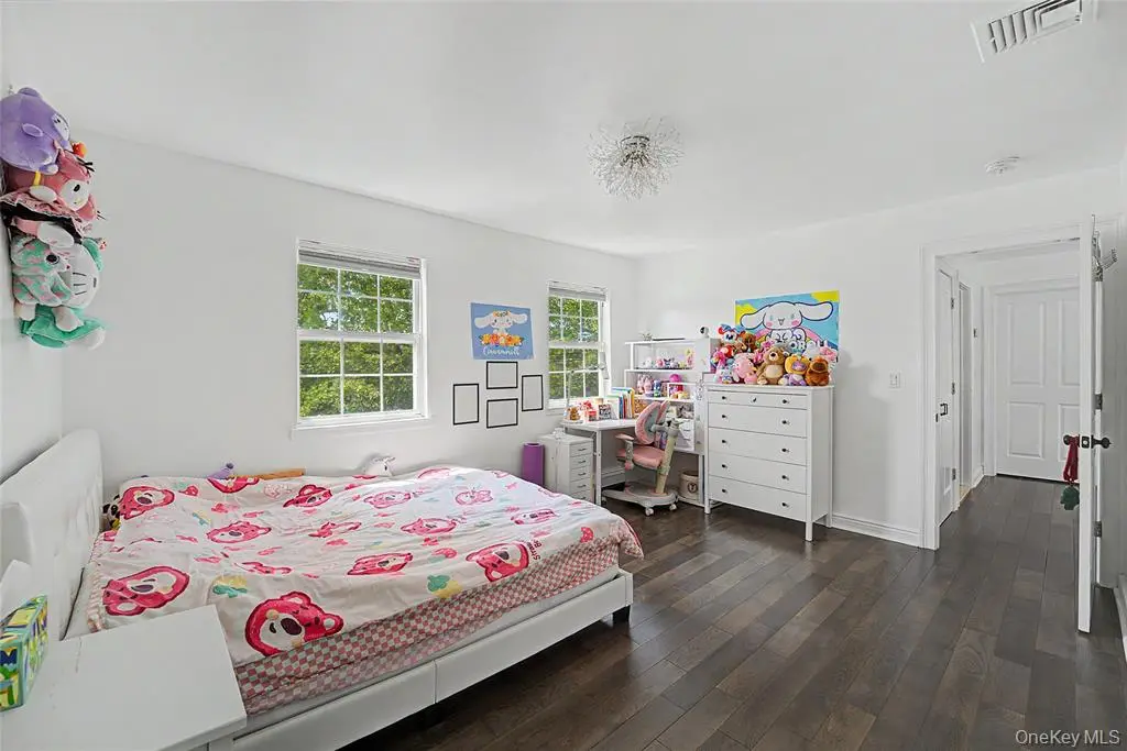 Bedroom with wood floor