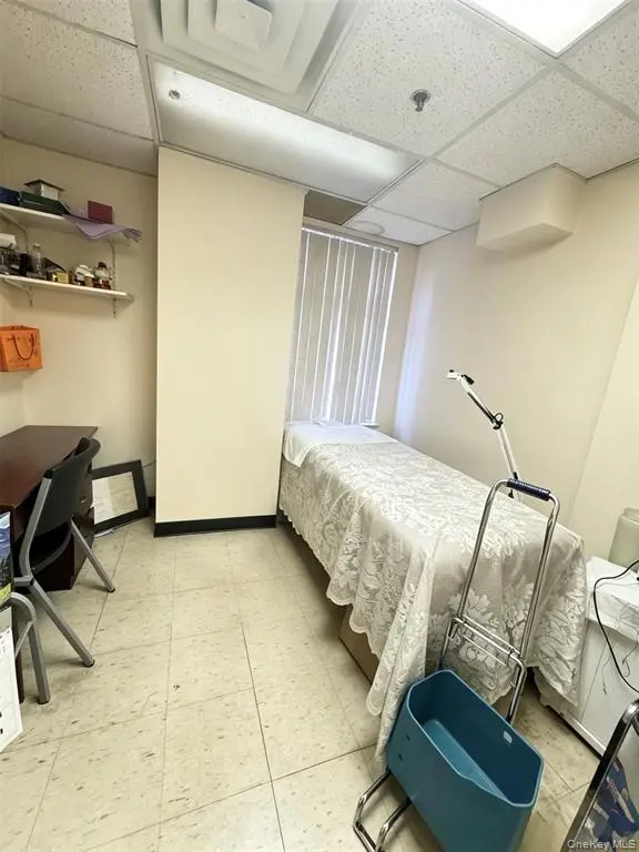 Treatment room with examination bed