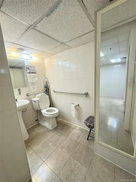 Bathroom with sink and shower