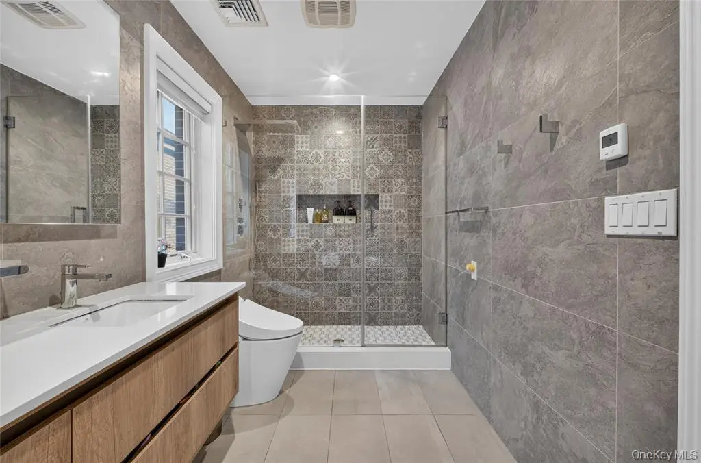 Bathroom vanity and shower