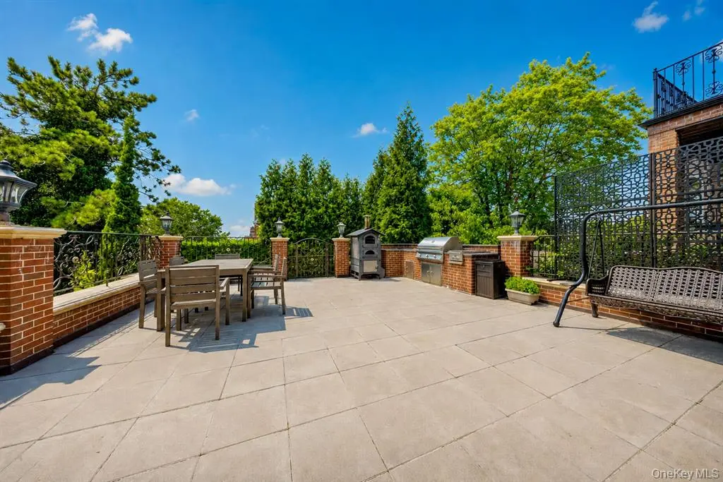 Outdoor terrace with table and seating