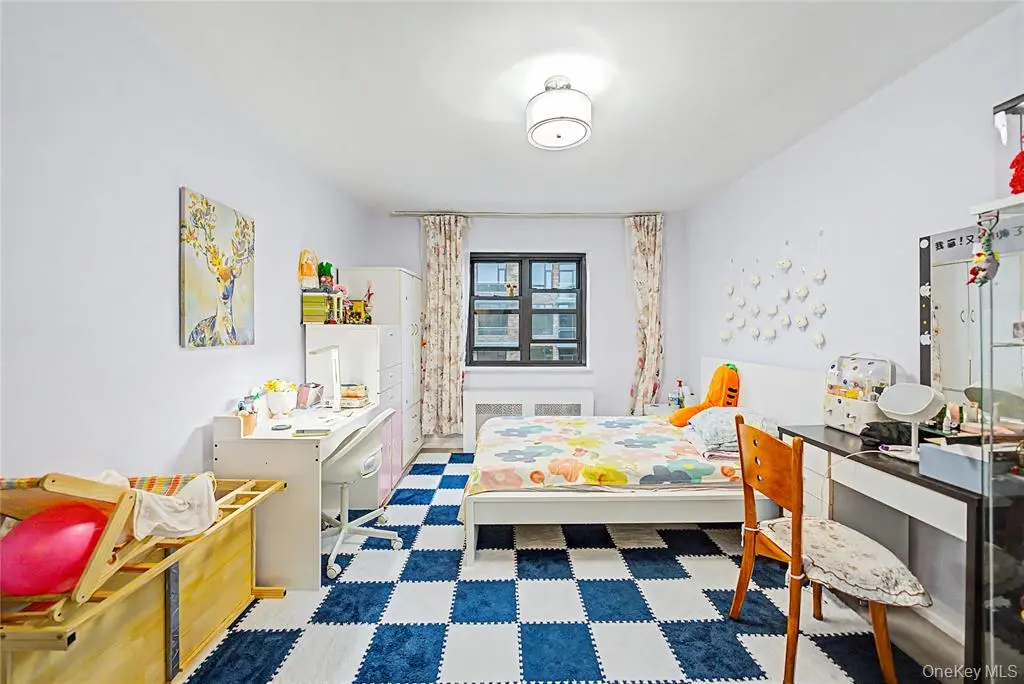 Bedroom with bed and desk