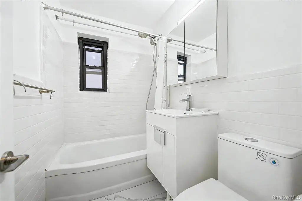 Bathroom with bathtub and toilet