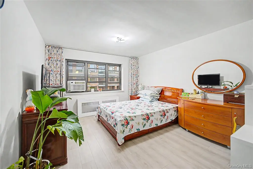 Bedroom with bed and dresser