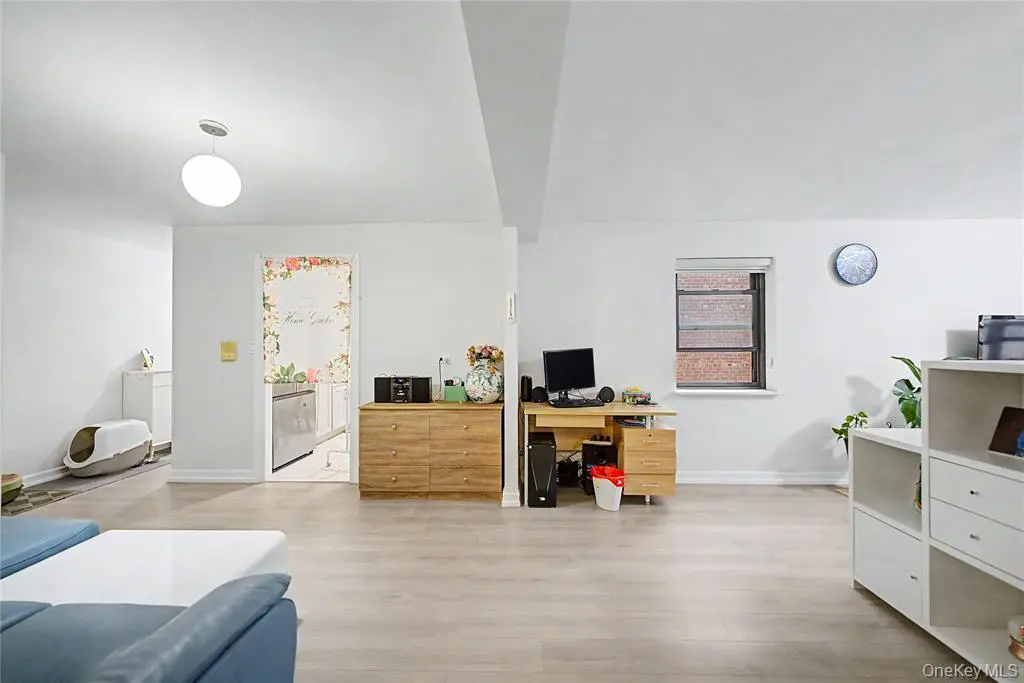 Living and dining area with windows