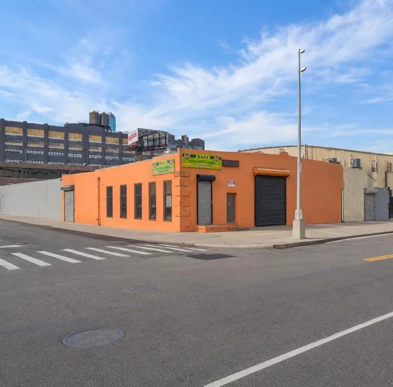 Long Island City industrial warehouse exterior at the street corner