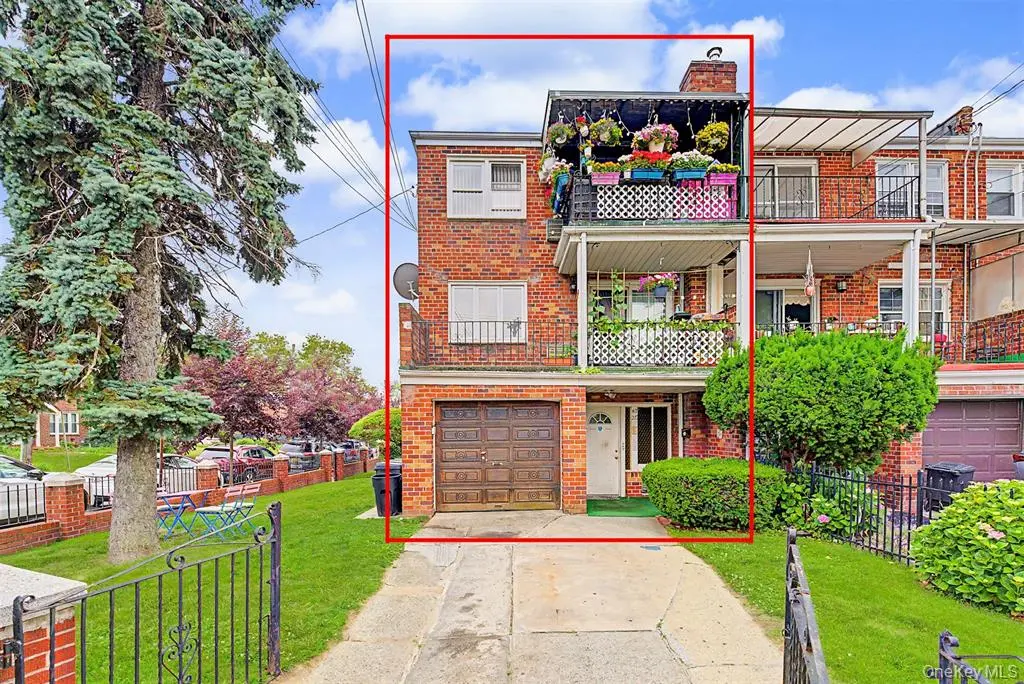 Corner brick multi-family home exterior in Flushing