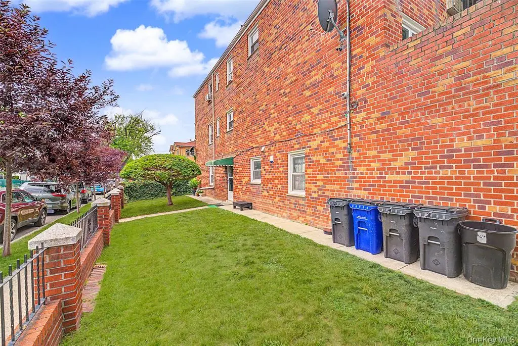 Side yard beside the brick residence