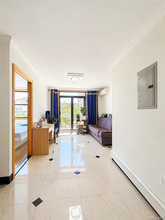 Living room opening to the private terrace