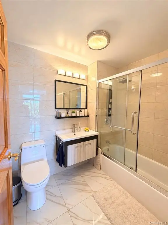 Full bathroom with glass shower