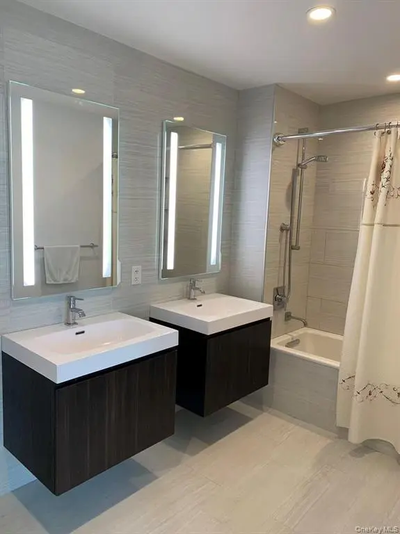 Modern full bathroom with double vanity