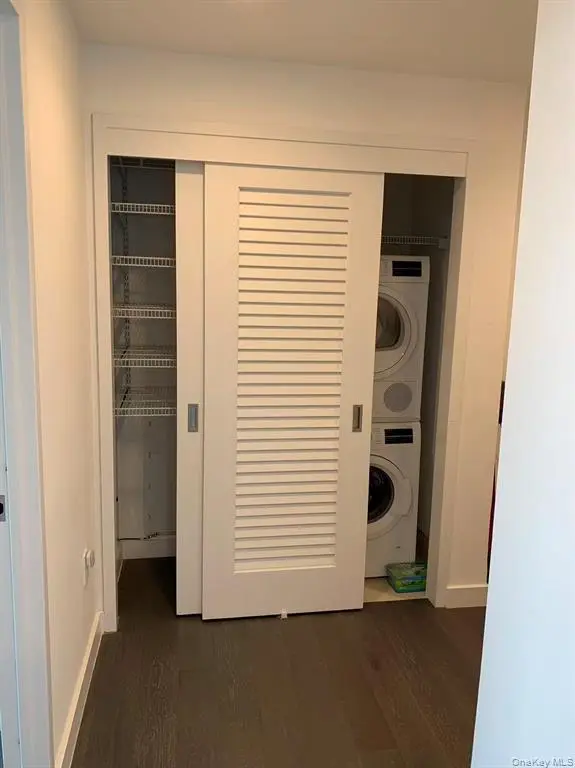 In-unit stacked washer and dryer