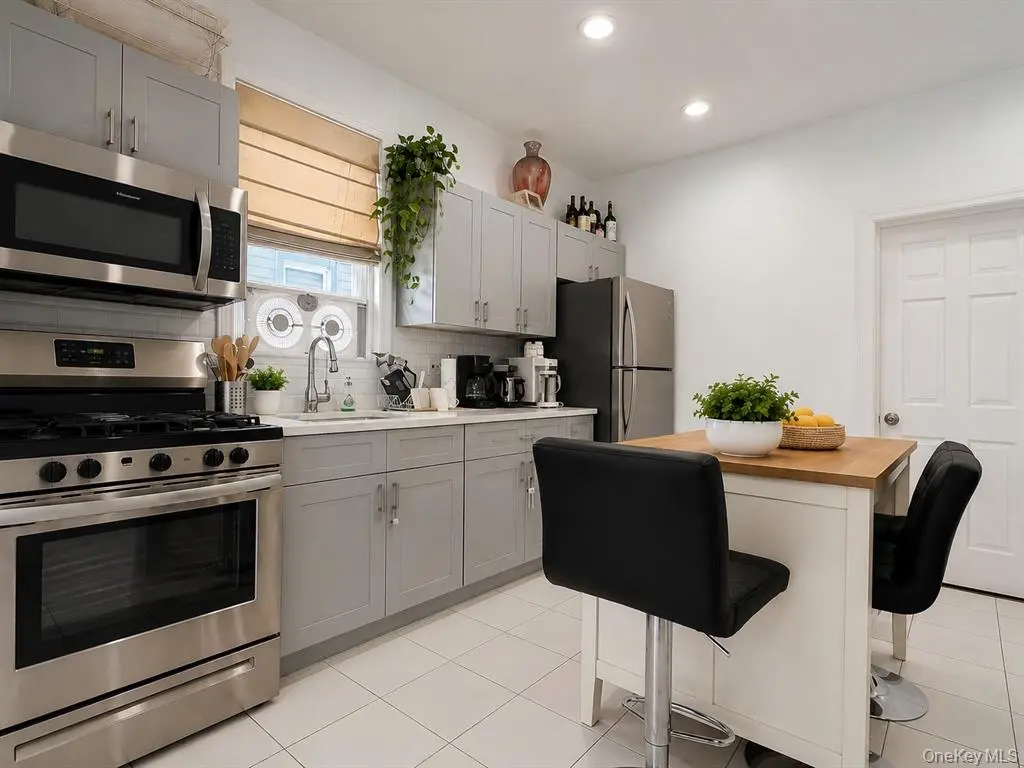 Updated kitchen with stainless steel range