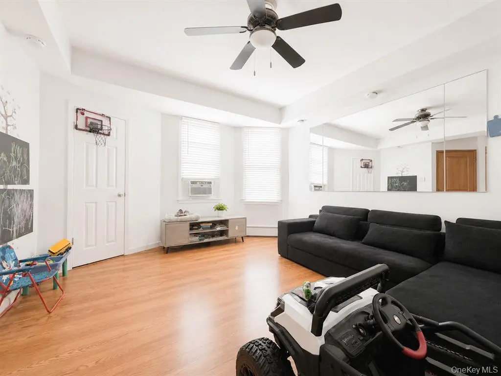 Living and dining space with hardwood flooring