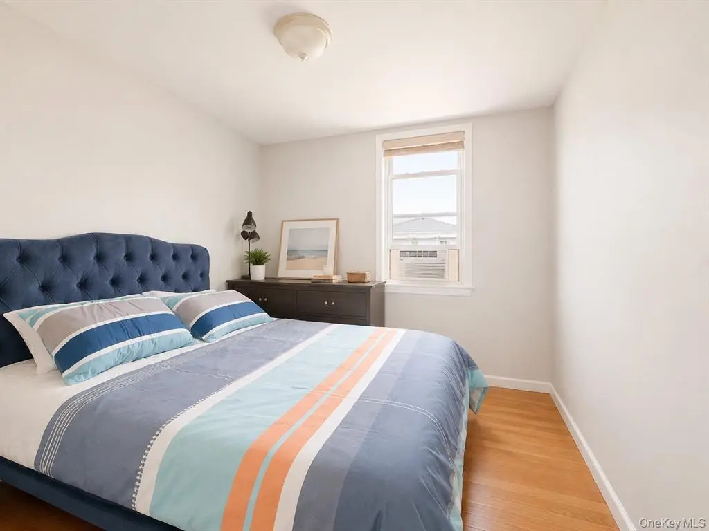 Additional bedroom with hardwood floor