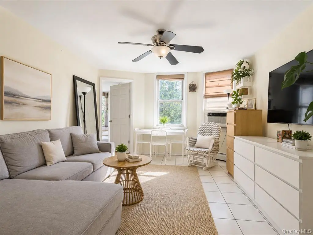 Spacious living room with windows