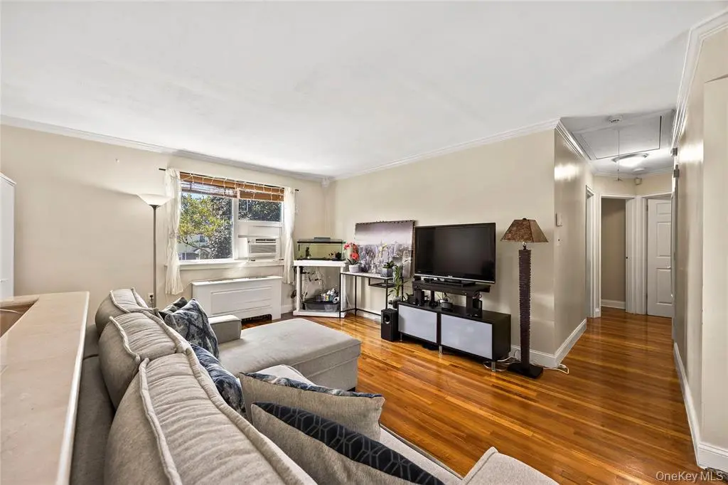 Bright living room with hardwood floors