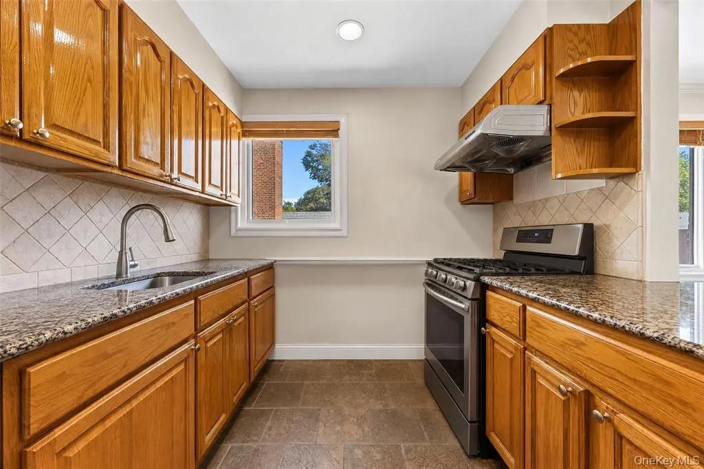 Kitchen cabinetry and stone counters