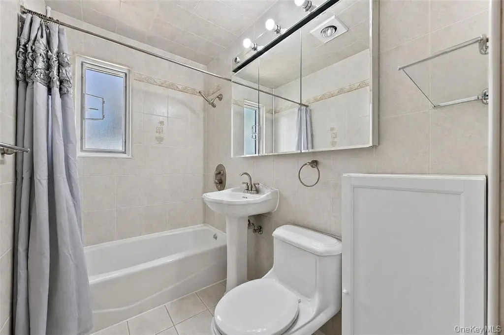Full bathroom with tub