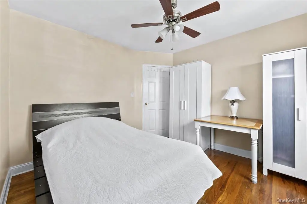 Additional bedroom with hardwood floor