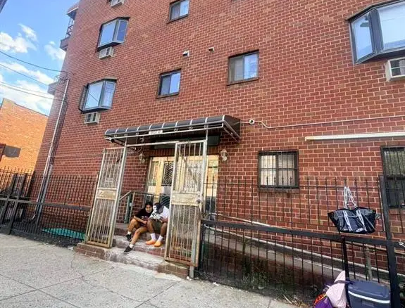Brick apartment building entrance in Elmhurst