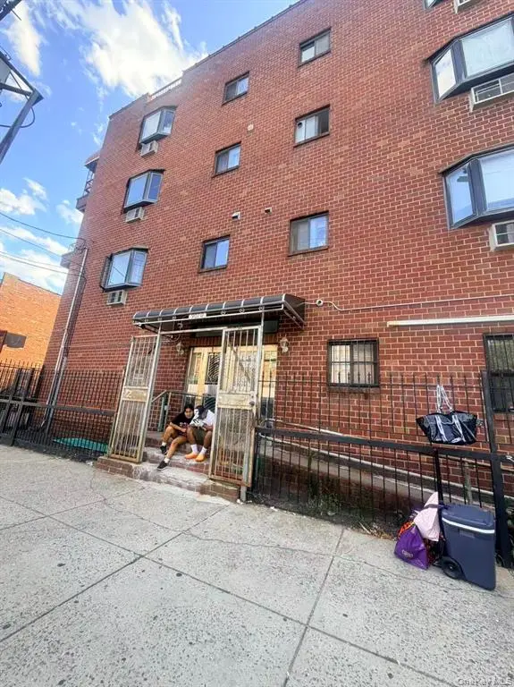 Brick apartment building entrance in Elmhurst