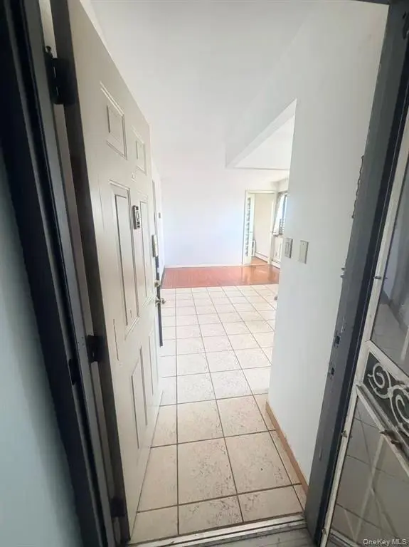 Apartment entry and tiled hall