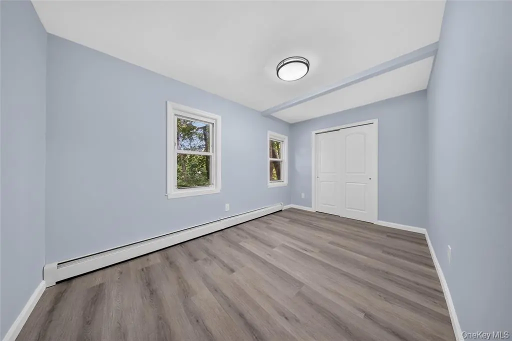 Bright bedroom with two windows