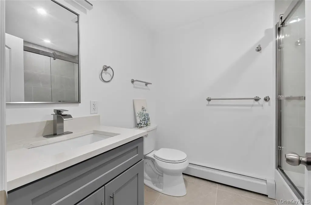 Full bathroom with glass shower