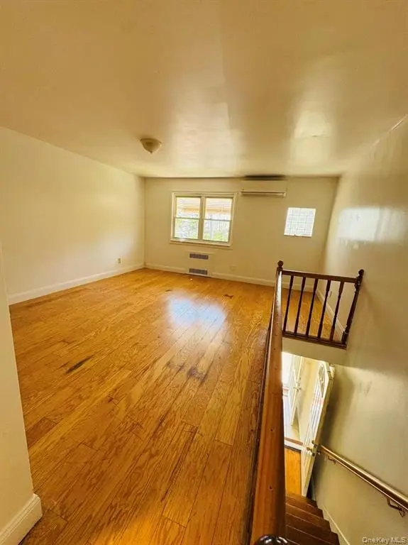 Bright living room with hardwood floor