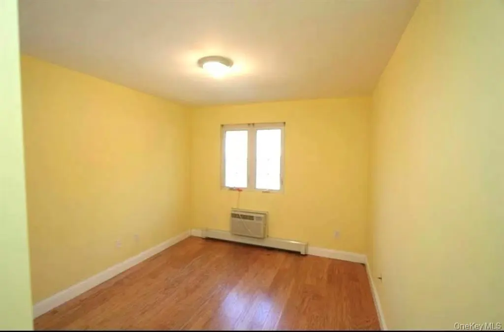 Bedroom with hardwood floor