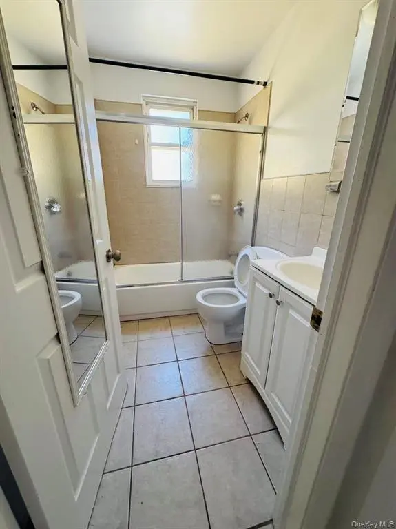 Full bathroom with tub