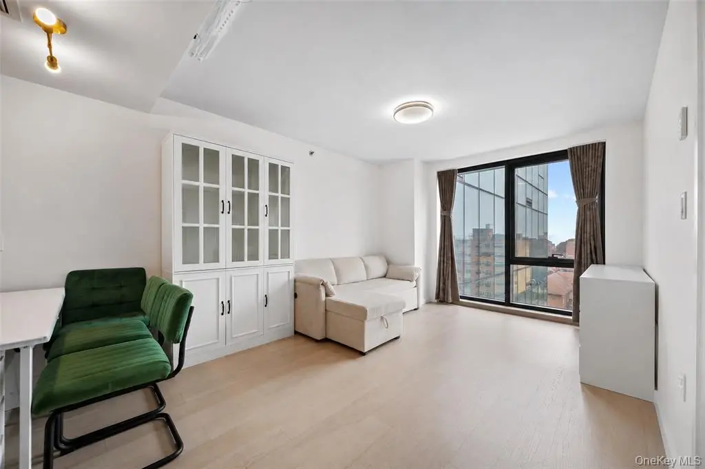 West-facing living room with large window
