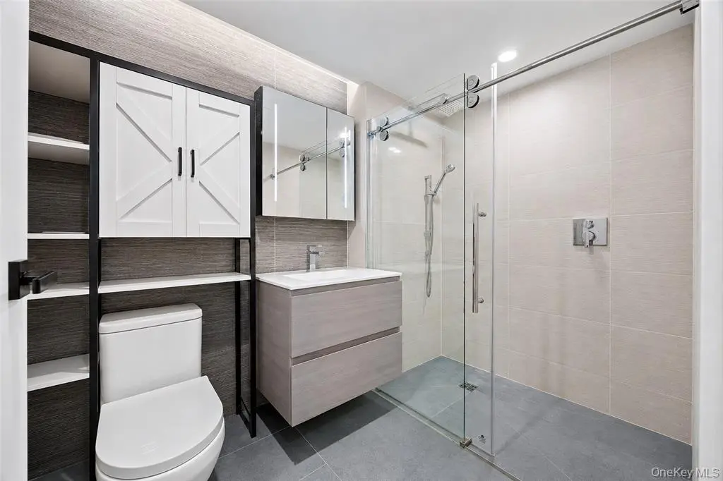 Modern bathroom with glass shower enclosure