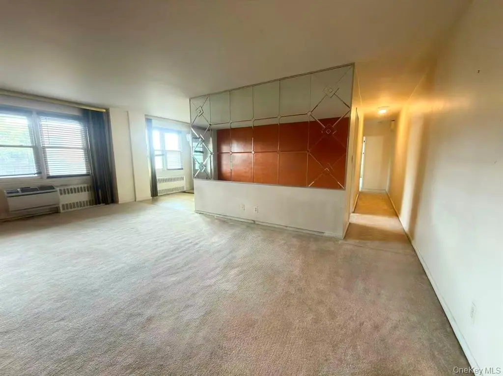 Living room with natural light and balcony access