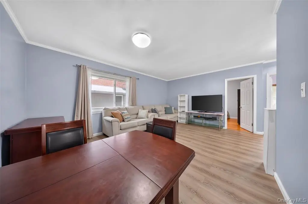 Bright dining room with modern flooring